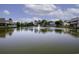 Scenic view of the pond, featuring a fountain, enhancing the community's tranquil atmosphere at 901 Southwind Ct., Garden City Beach, SC 29576