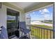 Balcony view of beach and ocean, offering a serene outdoor living space with bar-height seating at 9400 Shore Dr. # 509, Myrtle Beach, SC 29572