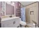 Well-lit bathroom featuring a tiled shower, modern vanity, and stylish fixtures at 9400 Shore Dr. # 509, Myrtle Beach, SC 29572
