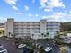 Beautiful exterior view of Sands Beach Club, featuring ample parking and meticulous landscaping at 9400 Shore Dr. # 509, Myrtle Beach, SC 29572