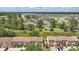 A scenic aerial view of townhomes nestled in a community with lush greenery and tranquil lakes, offering a serene lifestyle at 951 Plantation Dr. # F8, Little River, SC 29566