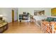 Cozy living room offering wood-look flooring and view to the kitchen at 951 Plantation Dr. # F8, Little River, SC 29566