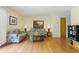 Spacious living room featuring wood-look flooring and abundant natural light at 951 Plantation Dr. # F8, Little River, SC 29566