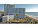 Stunning oceanfront condo building with a pool, beach access, and ample parking at 9840 Queensway Blvd. # 329, Myrtle Beach, SC 29572