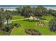 Well-manicured lawns, tall trees, and walking path lead to the beach at 9840 Queensway Blvd. # 329, Myrtle Beach, SC 29572