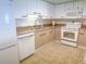Fully equipped kitchen featuring updated cabinets and appliances at 9840 Queensway Blvd. # 329, Myrtle Beach, SC 29572