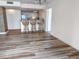 Open-concept kitchen with modern appliances, bar-style seating, and access to living room at 9840 Queensway Blvd. # 329, Myrtle Beach, SC 29572