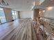 Well-lit living area featuring access to the outdoor balcony and a breakfast bar for casual dining at 9840 Queensway Blvd. # 329, Myrtle Beach, SC 29572
