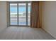 Bright living room has a large sliding glass door leading to the outside at 9840 Queensway Blvd. # 329, Myrtle Beach, SC 29572