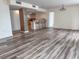 Bright open floor plan with stylish flooring and an inviting breakfast bar at 9840 Queensway Blvd. # 329, Myrtle Beach, SC 29572