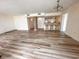 Spacious living room with hardwood floors, bar seating and access to the kitchen at 9840 Queensway Blvd. # 329, Myrtle Beach, SC 29572