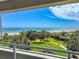 Breathtaking ocean views from the balcony, overlooking lush tropical landscaping and sandy beach at 9840 Queensway Blvd. # 329, Myrtle Beach, SC 29572
