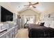 Spacious bedroom featuring vaulted ceilings, natural light, and an exercise area for a convenient home gym at 1053 Williston Loop # 1053, Murrells Inlet, SC 29576