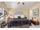 This bedroom features a plush bed, stylish furnishings, and an adjacent exercise area for convenient fitness at 1053 Williston Loop # 1053, Murrells Inlet, SC 29576