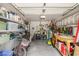 Functional garage space with storage shelves, workbench, and well-organized tools and equipment at 1053 Williston Loop # 1053, Murrells Inlet, SC 29576
