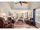 Spacious living room with vaulted ceilings, hardwood floors, and two comfortable sofas at 1053 Williston Loop # 1053, Murrells Inlet, SC 29576