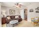Cozy living room with paneled walls, and a stylish seating arrangement with a sliding barn door entryway at 1053 Williston Loop # 1053, Murrells Inlet, SC 29576