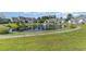 Pond in a lush, green community with fountain and surrounding homes at 1053 Williston Loop # 1053, Murrells Inlet, SC 29576