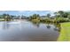 Scenic pond view with a bridge and fountain, surrounded by lush greenery at 1053 Williston Loop # 1053, Murrells Inlet, SC 29576