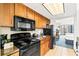 Efficient kitchenette space features updated appliances and an open layout for comfortable in-room dining at 1105 S Ocean Blvd. # 1048, Myrtle Beach, SC 29577