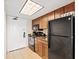 Compact kitchenette with modern appliances, cabinetry, and essentials for convenient meal preparation at 1105 S Ocean Blvd. # 1048, Myrtle Beach, SC 29577