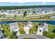 An aerial view showcases a Gathering-friendly neighborhood with waterfront properties and meticulously kept landscapes at 1124 Valetto Loop, Myrtle Beach, SC 29579