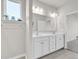 Bright bathroom features a double vanity with modern fixtures and plenty of counter space at 1124 Valetto Loop, Myrtle Beach, SC 29579