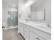 Bright bathroom with a double vanity, modern fixtures, and a glass-enclosed shower at 1124 Valetto Loop, Myrtle Beach, SC 29579