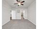 Large bedroom with en-suite bathroom featuring carpet and neutral paint at 1124 Valetto Loop, Myrtle Beach, SC 29579