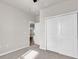 Bedroom view showcasing a large closet and a doorway leading to another room at 1124 Valetto Loop, Myrtle Beach, SC 29579