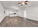 Bright, open-concept living area with hardwood floors and a view of the modern kitchen at 1124 Valetto Loop, Myrtle Beach, SC 29579