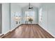 Bright sunroom with hardwood floors, a ceiling fan, and plenty of natural light at 1124 Valetto Loop, Myrtle Beach, SC 29579