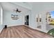 Bright sunroom with sliding glass doors to the backyard patio and mounted television at 1124 Valetto Loop, Myrtle Beach, SC 29579