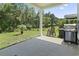 Relaxing back patio with a grill, rocking chair, and view of the backyard at 1146 Joywood Dr., Longs, SC 29568
