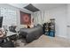 Bedroom with cozy carpet flooring, large wall tapestry, and desk area at 1146 Joywood Dr., Longs, SC 29568