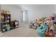 Bright bedroom with cozy carpet flooring and plentiful decor at 1146 Joywood Dr., Longs, SC 29568