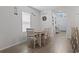 Dining area featuring seating for six, bright natural light, and modern decor at 1146 Joywood Dr., Longs, SC 29568