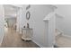Bright foyer with a stairway featuring an attractive table, decor, and seamless flooring into other areas of the home at 1146 Joywood Dr., Longs, SC 29568