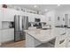 Bright kitchen featuring stainless steel appliances, granite countertops, an island with seating and an open design concept at 1146 Joywood Dr., Longs, SC 29568