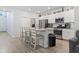 Modern kitchen featuring stainless steel appliances, granite countertops, and a large island with barstool seating at 1146 Joywood Dr., Longs, SC 29568
