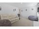 Comfortable living room with plush seating, neutral walls, and carpet at 1146 Joywood Dr., Longs, SC 29568