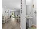 Open-concept living space featuring natural light and modern flooring at 1146 Joywood Dr., Longs, SC 29568