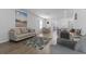Open living space connecting the living room, dining area, and kitchen for seamless entertaining at 1146 Joywood Dr., Longs, SC 29568