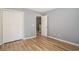 Bedroom showcasing wood floors, closet space and doorway at 1196 Harvester Circle # 1196, Myrtle Beach, SC 29579