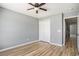 Bedroom featuring wood floors, closet space and doorway at 1196 Harvester Circle # 1196, Myrtle Beach, SC 29579