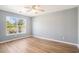 Bright bedroom with wood floors and large window overlooking the outdoors at 1196 Harvester Circle # 1196, Myrtle Beach, SC 29579