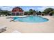 Resort-style community pool with plenty of seating, perfect for relaxation and recreation at 1196 Harvester Circle # 1196, Myrtle Beach, SC 29579
