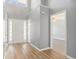 Entryway featuring wood floors, high ceilings and a storm door with lots of natural light at 1196 Harvester Circle # 1196, Myrtle Beach, SC 29579