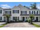 Charming townhome with well-maintained landscaping and neutral siding under a bright blue sky at 1196 Harvester Circle # 1196, Myrtle Beach, SC 29579