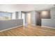 Upstairs loft area with wood floors, neutral walls, and lots of natural light at 1196 Harvester Circle # 1196, Myrtle Beach, SC 29579